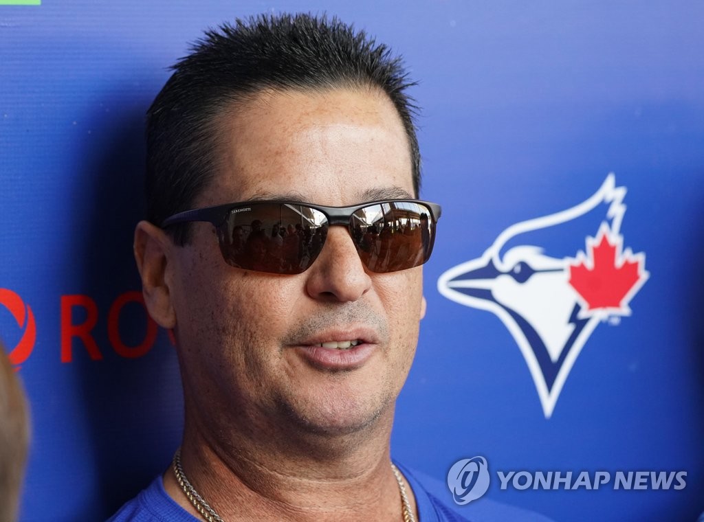 Toronto Blue Jays' manager Charlie Montoyo speaks to reporters at TD Ballpark in Dunedin, Florida, on Feb. 17, 2020. (Yonhap)