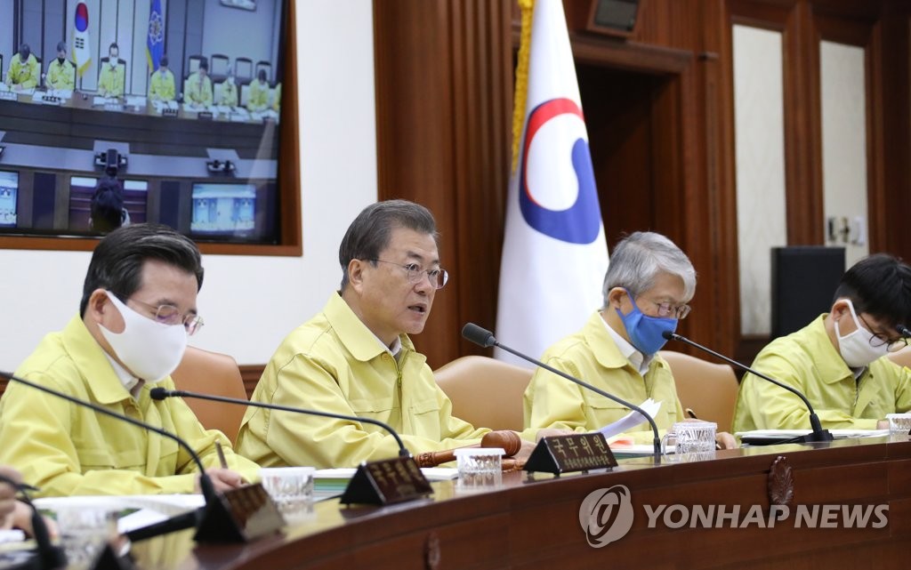 President Moon Jae-in (2nd from L) speaks at the start of a weekly Cabinet meeting at the government office complex in Seoul on March 17, 2020. (Yonhap)