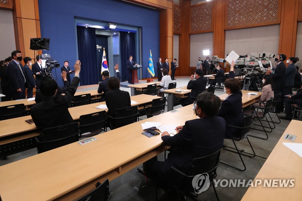 President Moon Jae-in takes questions from reporters at the Chunchugwan press briefing room of Cheong Wa Dae on May 10, 2020. (Yonhap)