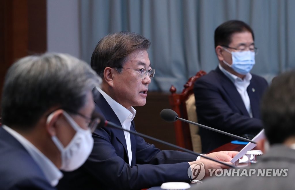 President Moon Jae-in (2nd from L) speaks at a meeting with his senior secretaries at Cheong Wa Dae in Seoul on June 15, 2020. (Yonhap)