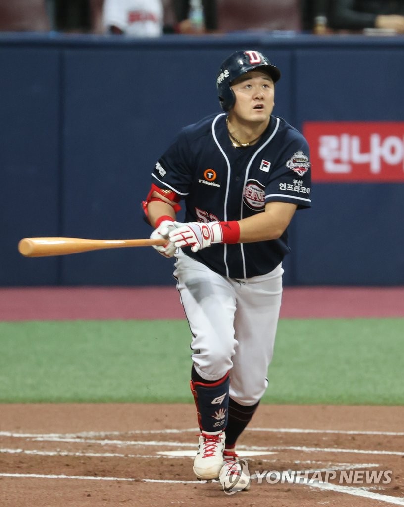 In this file photo from Nov. 23, 2020, Choi Joo-hwan, then of the Doosan Bears, watches his double against the NC Dinos in the top of the second inning of Game 5 of the Korean Series at Gocheok Sky Dome in Seoul. (Yonhap)