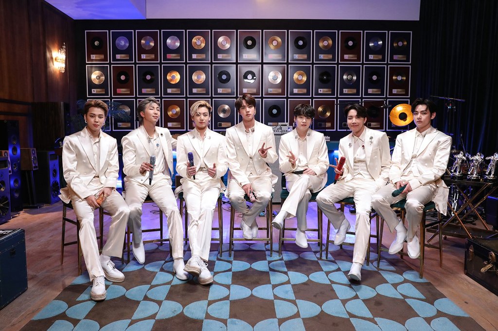 This photo, provided by Big Hit Entertainment on Feb. 24, 2021, shows BTS on a set for "MTV Unplugged." (PHOTO NOT FOR SALE) (Yonhap)