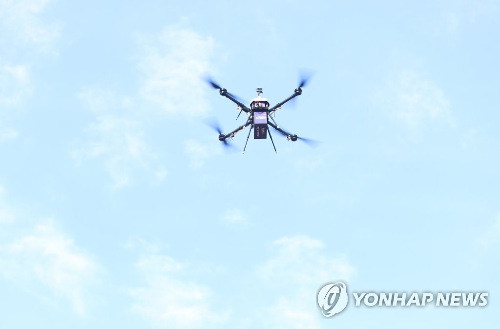 This unrelated file photo, taken Jan. 27, 2022, shows a drone flying in skies above Daegu, 302 kilometers south of Seoul. (Yonhap)