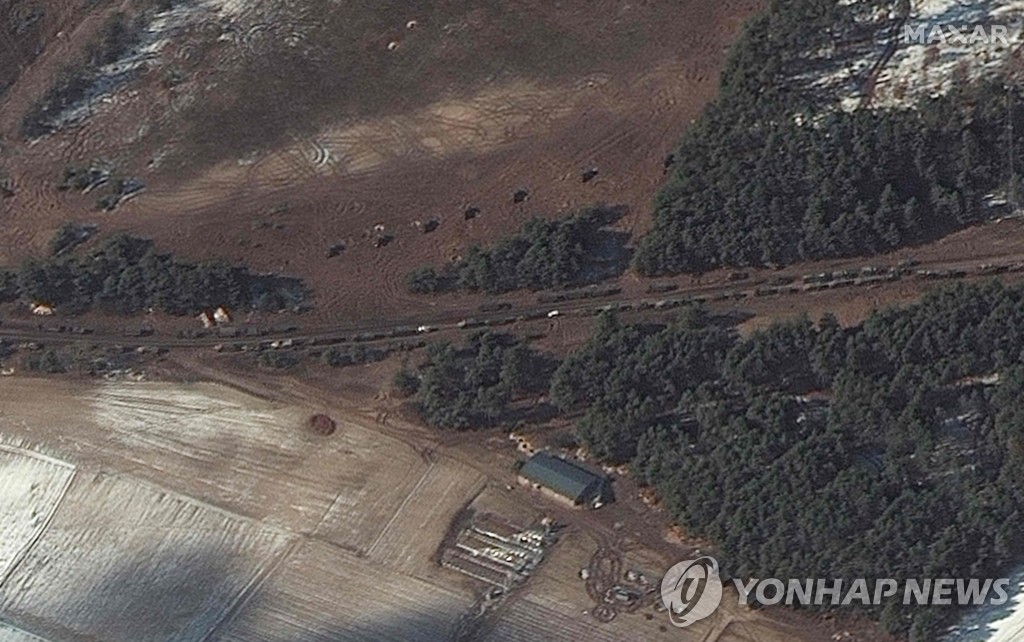 A procession of Russian military supply trucks caught on a road in the Ukrainian metropolitan area