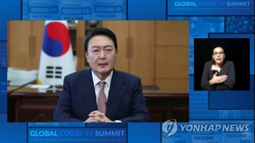 President Yoon Suk-yeol delivers remarks in a prerecorded video message for the second Global COVID-19 Summit held May 12, 2022, in this image provided by the presidential office. (PHOTO NOT FOR SALE) (Yonhap)