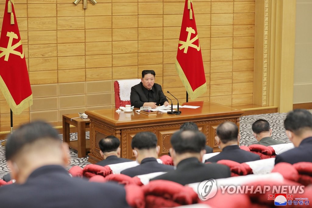 North Korean leader Kim Jong-un (C) speaks at a politburo meeting of the ruling Workers' Party to inspect the country's antivirus efforts against the COVID-19 pandemic on May 14, 2022, in this photo released by the North's official Korean Central News Agency. (For Use Only in the Republic of Korea. No Redistribution) (Yonhap)