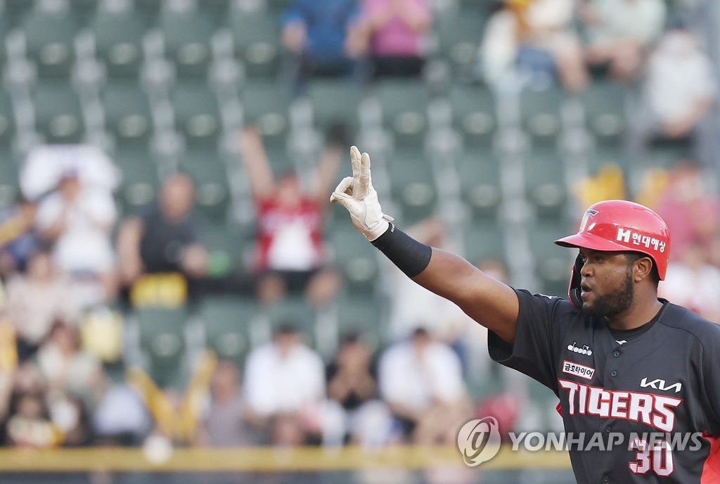In this file photo from June 24, 2022, Socrates Brito of the Kia Tigers celebrates his RBI double against the Doosan Bears during the top of the second inning of a Korea Baseball Organization regular season game at Jamsil Baseball Stadium in Seoul. (Yonhap)