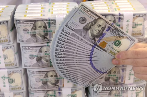 韓国ウォン安　対ドルで１４００ウォン突破＝１３年半ぶり安値