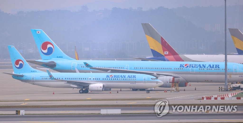 Airplanes remain parked at Incheon International Airport. (Yonhap)