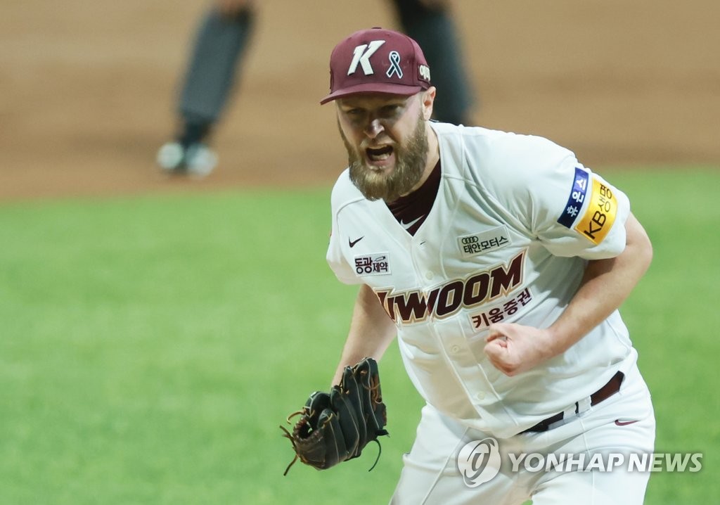 In this file photo from Nov. 4, 2022, Kiwoom Heroes starter Eric Jokisch celebrates after striking out Juan Lagares of the SSG Landers to end the top of the first inning of Game 3 of the Korean Series at Gocheok Sky Dome in Seoul. (Yonhap)