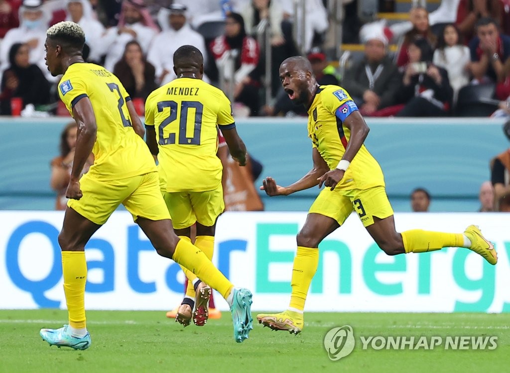 Enner Valencia of Ecuador (R) celebrates his goal against Qatar during the teams' Group A match at the FIFA World Cup at Al Bayt Stadium in Al Khor, Qatar, on Nov. 20, 2022. (Yonhap)