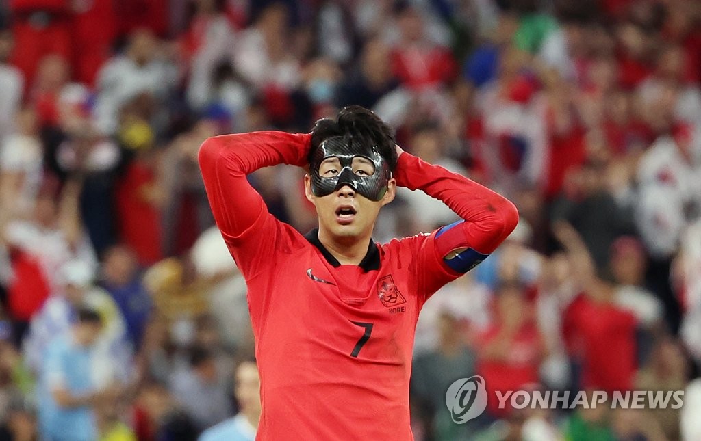 South Korea captain Son Heung-min reacts to a play during a scoreless draw with Uruguay in the countries' Group H match at the FIFA World Cup at Education City Stadium in Al Rayyan, west of Doha, on Nov. 24, 2022. (Yonhap)