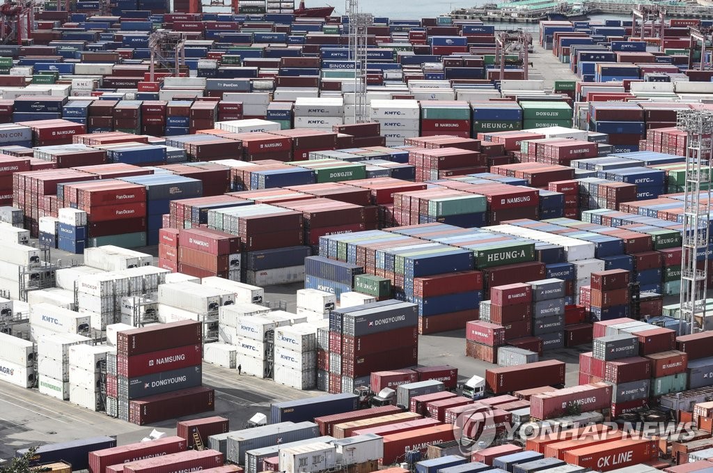 Containers are stacked at a quay in the southeastern port city of Busan on Nov. 30, 2022. (Yonhap)