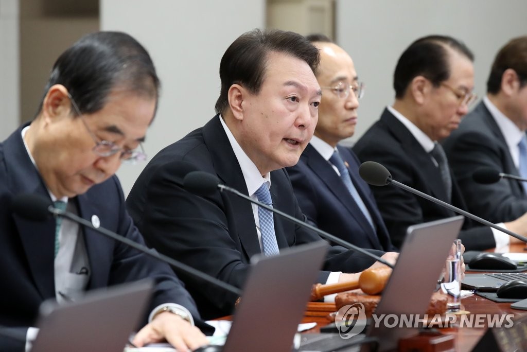 President Yoon Suk Yeol speaks at a Cabinet meeting held at the presidential office in central Seoul on Feb. 21, 2023. (Pool photo) (Yonhap)