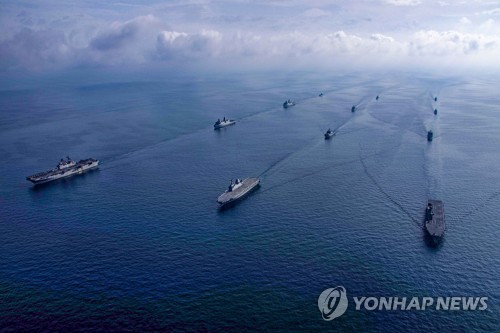 This photo, released by the South Korean Navy on March 22, 2023, shows South Korean and U.S. warships engaging in combined drills in waters off the southern city of Pohang. (PHOTO NOT FOR SALE) (Yonhap)