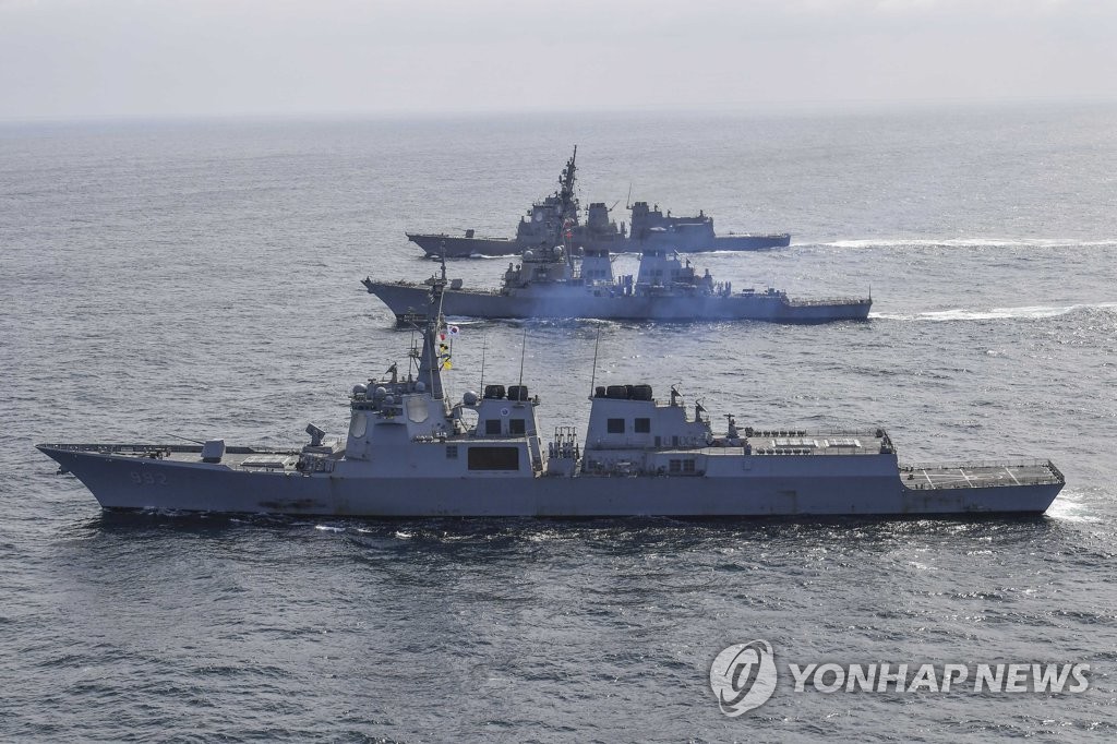 This file photo, released by the South Korean Navy on April 17, 2023, shows three Aegis-equipped destroyers -- the South's Yulgok Yi I (front), the Benfold (C) of the U.S. Navy and the JS Atago of the Japan Maritime Self-Defense Force -- sailing in waters off South Korea's east coast. (PHOTO NOT FOR SALE) (Yonhap)