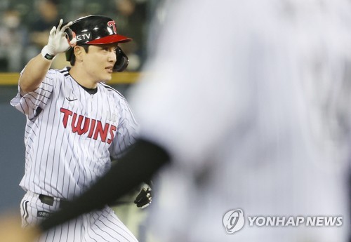 In this file photo from May 10, 2023, Park Dong-won of the LG Twins celebrates his RBI double against the Kiwoom Heroes during the bottom of the sixth inning of a Korea Baseball Organization regular season game at Jamsil Baseball Stadium in Seoul. (Yonhap) 