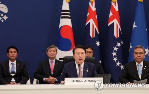 President Yoon Suk Yeol (C) speaks during a summit with leaders of Pacific island nations at the former presidential compound of Cheong Wa Dae in Seoul on May 29, 2023. (Yonhap)