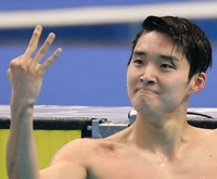 (LEAD (Asiad) Swimmer Kim Woo-min captures 3rd gold in Hangzhou