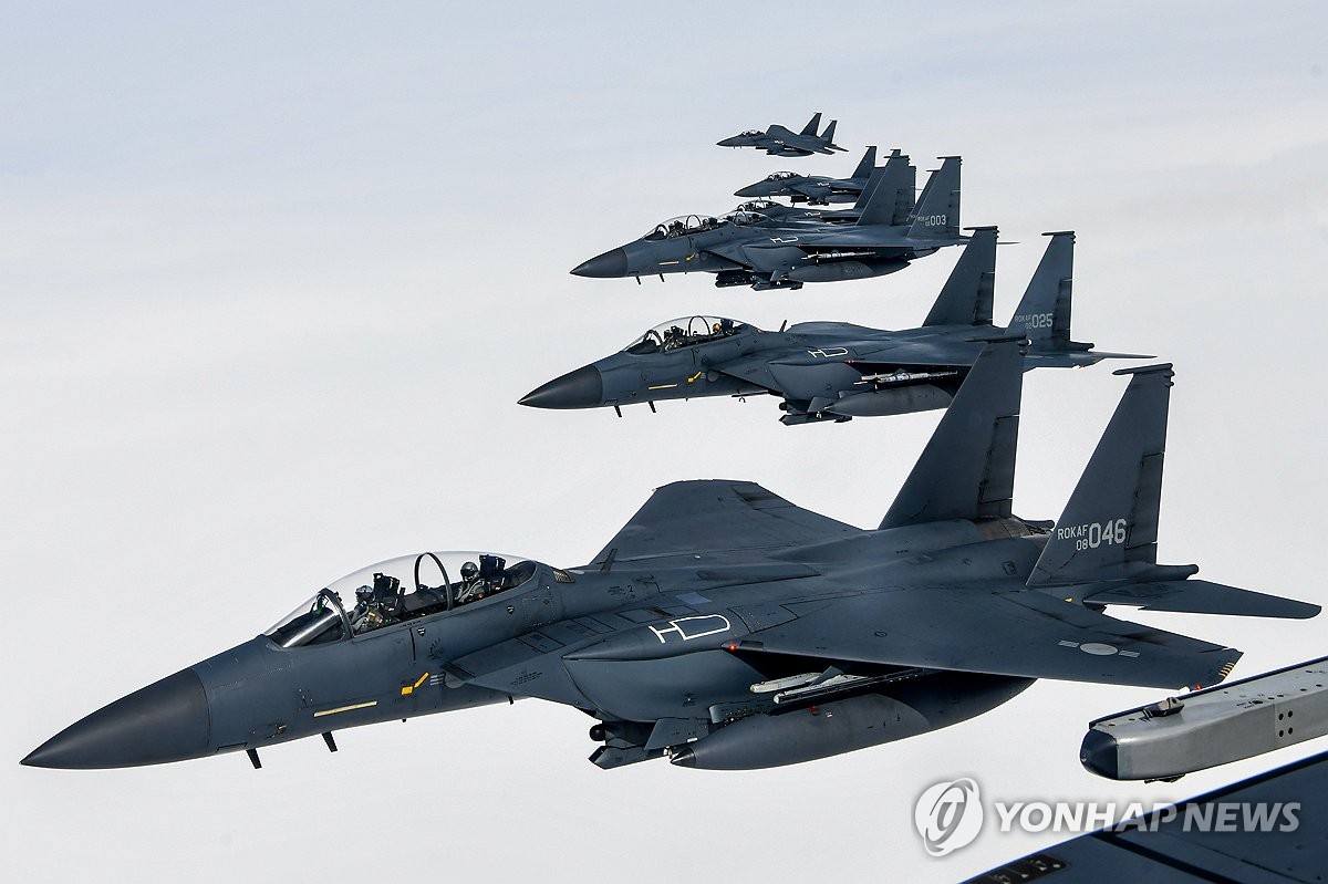 This unrelated photo, provided by the Air Force on March 6, 2024, shows F-15K fighter jets taking part in an air exercise. (PHOTO NOT FOR SALE) (Yonhap)
