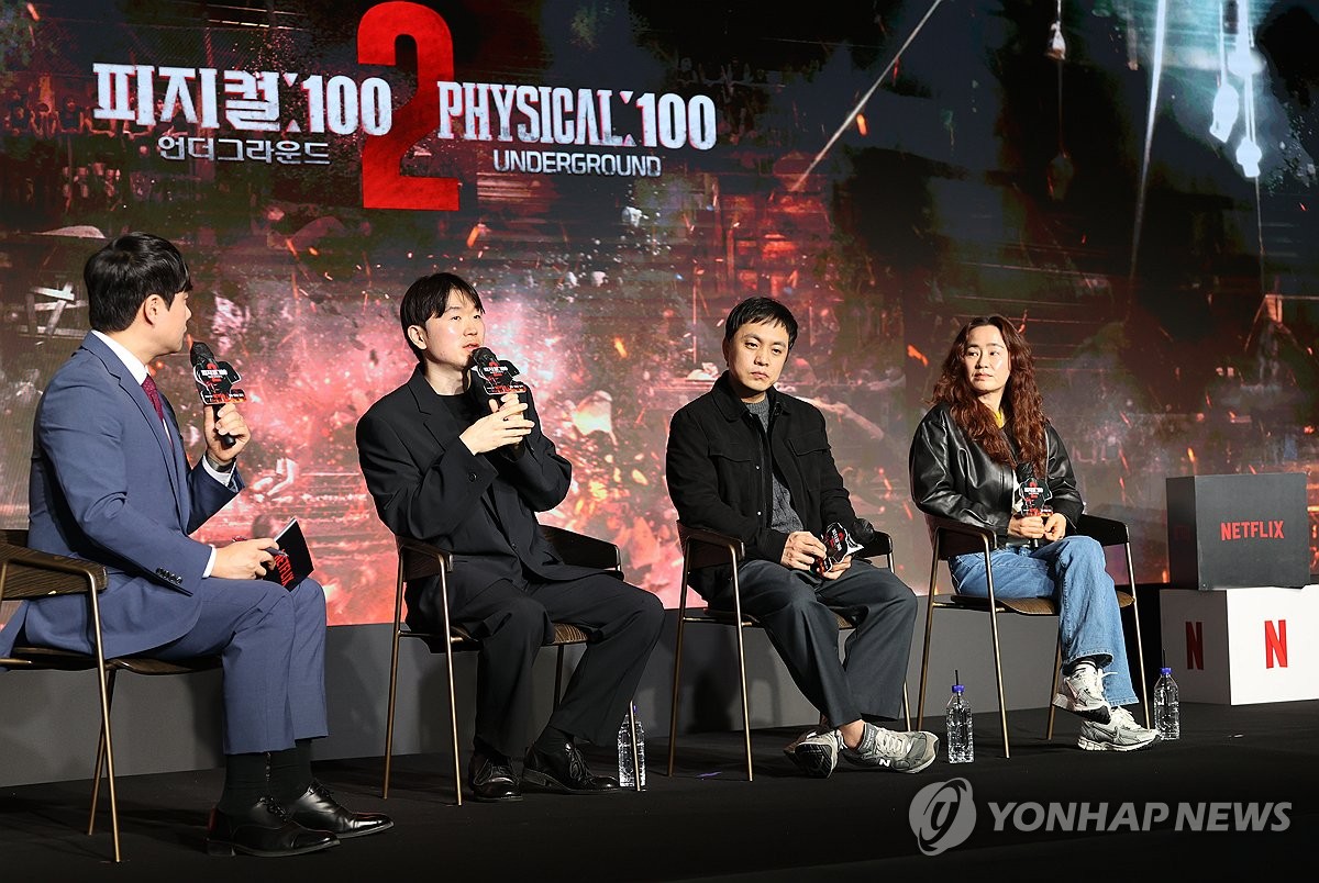 Director Jang Ho-ki (2nd from L) talks during a press conference for Netflix's reality show "Physical: 100 Season 2 - Underground" in Seoul on March 14, 2024. (Yonhap) 