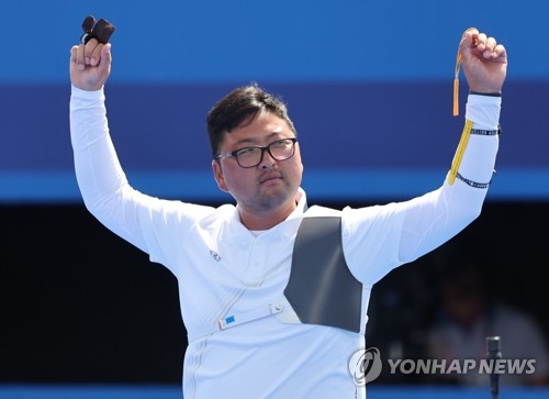  '지구최강 궁사' 김우진 "메달 땄다고 젖어있지마…해뜨면 말라"